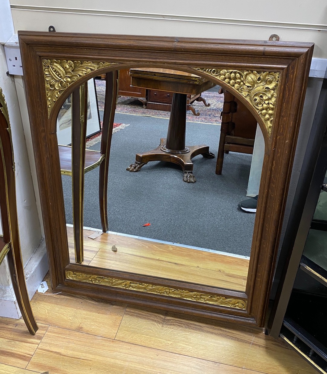 A late 19th century French oak wooden carved and parcel gilt painted rectangular wall mirror, height 91cm